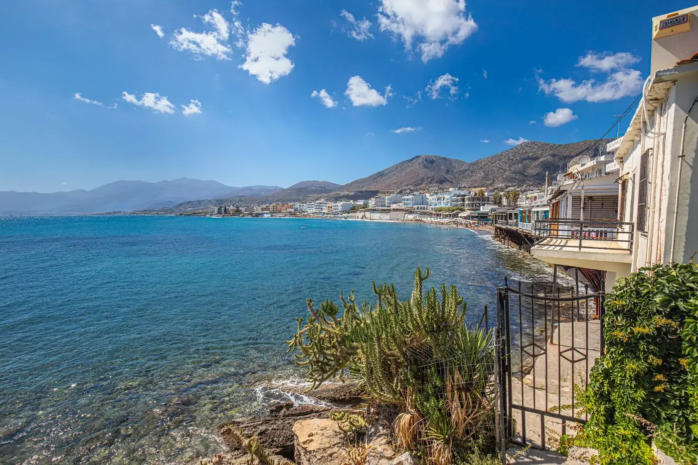 Beautiful Mediterranean coastal town with clear skies and blue sea.