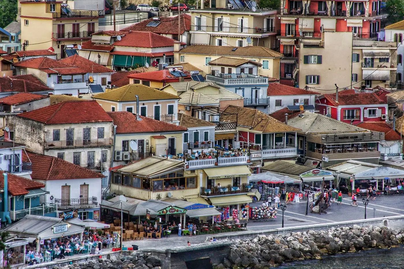 Explore picturesque Leros with boats on crystal blue waters, Greece's hidden gem.