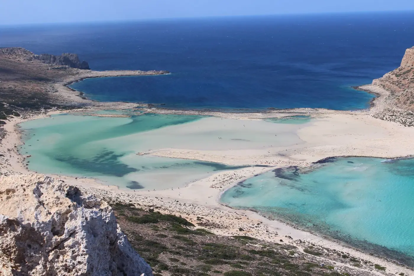 A breathtaking aerial shot of Balos Lagoon in Kissamos, Greece, with vibrant turquoise waters.