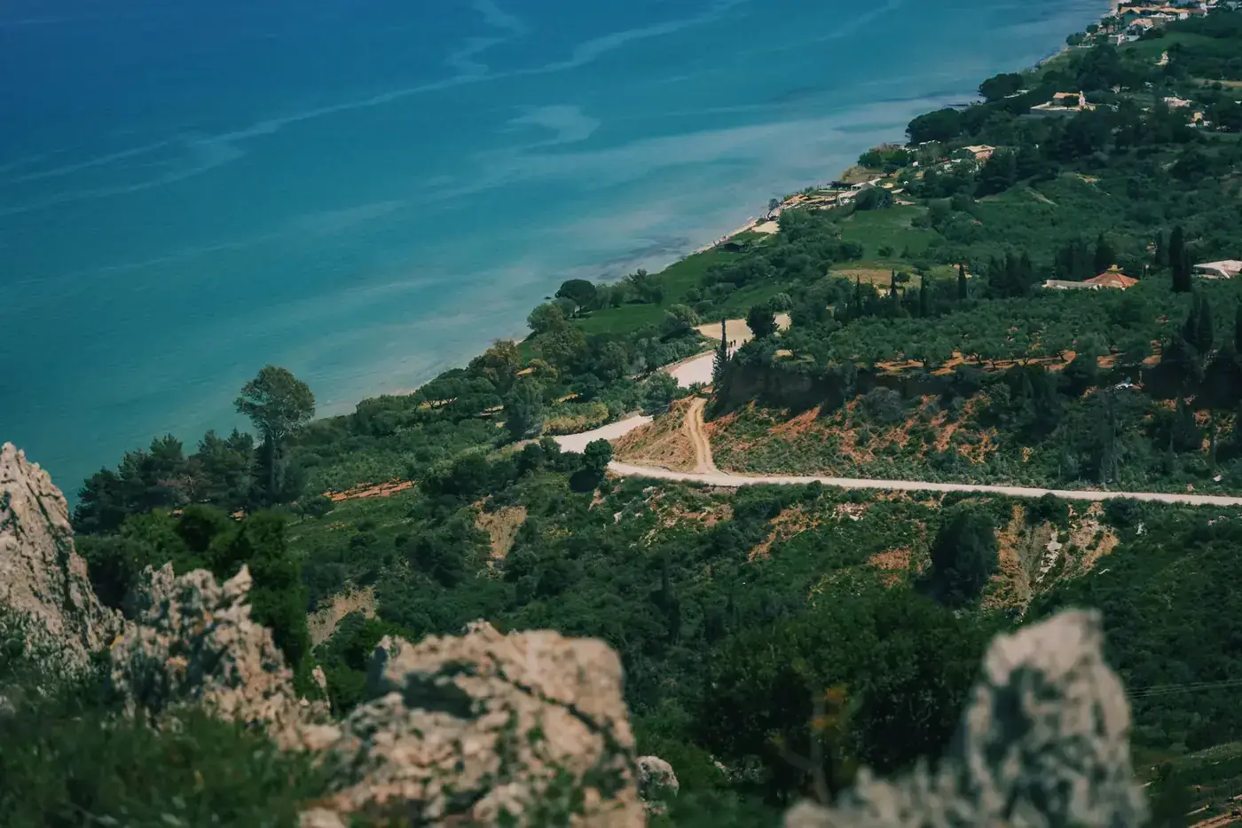 A stunning view of the rugged coastline and lush greenery of Zakynthos, Greece.