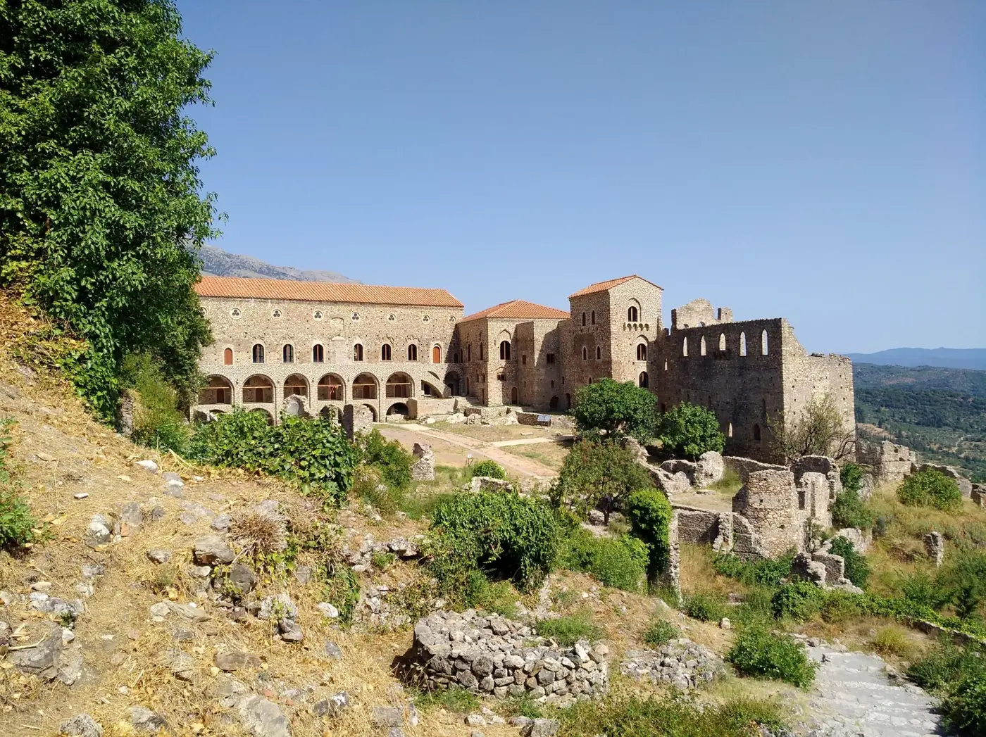 Explore the ancient ruins of the Mistra Monastery in Greece, a site of Gothic architecture.