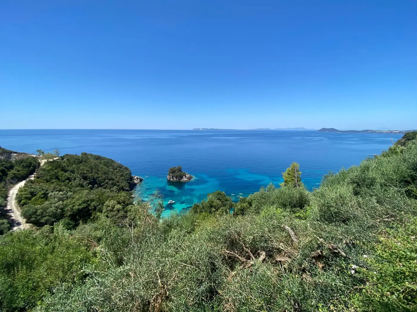 Beautiful panoramic view of the Ionian Sea from a coastal cliff in Parga, Greece.