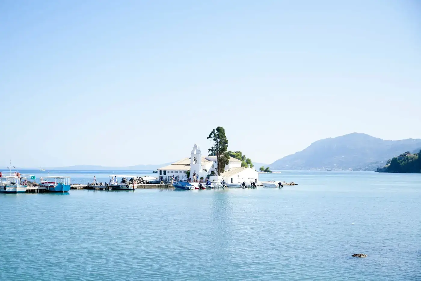 A beautiful view of Vlacherna Monastery and Mouse Island in Corfu, Greece.