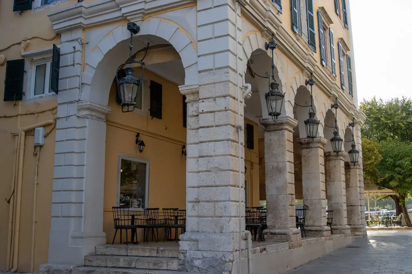 Charming Venetian-style building facade in Corfu, Greece, showcasing classic architecture.