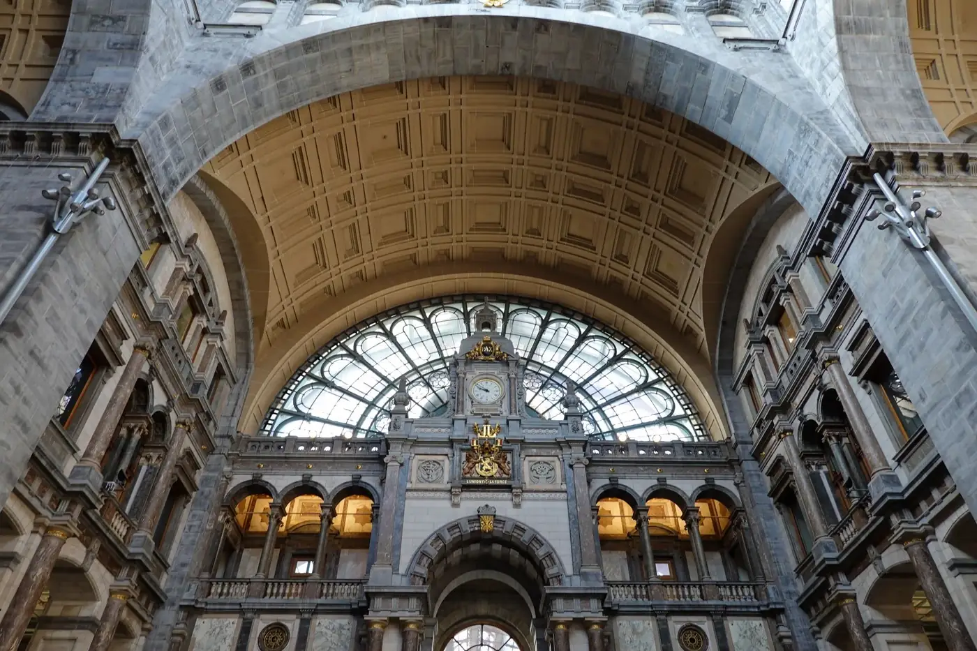 Stunning architectural detail of the grand arches inside Antwerp Central Station, Belgium.
