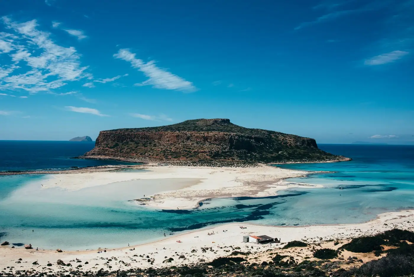 Aerial view of the beautiful Balos Beach Lagoon in Crete, Greece, showcasing turquoise waters and scenic landscape.