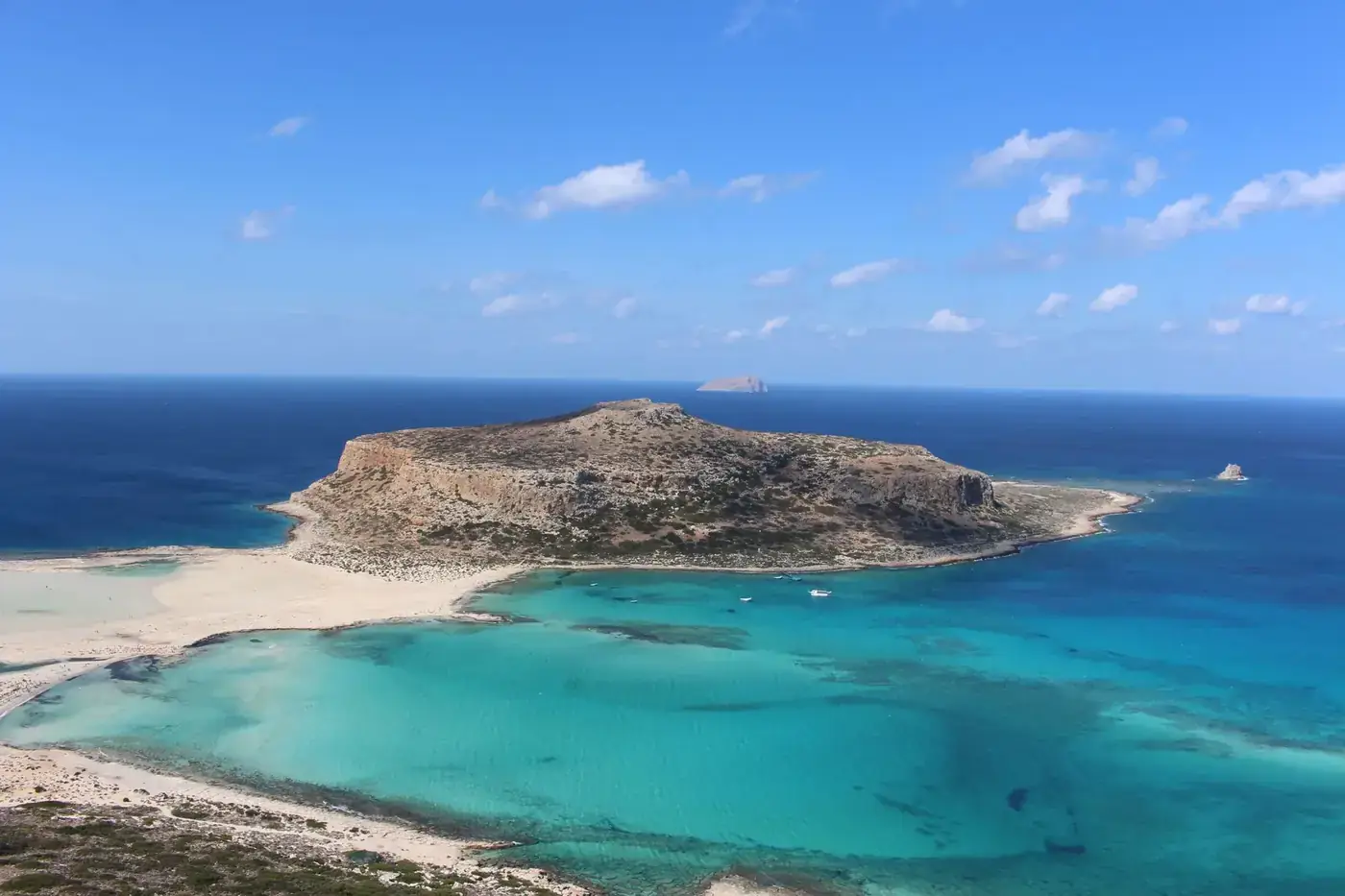 Discover the turquoise waters and stunning cliffs of Balos Beach Lagoon in Crete, Greece.
