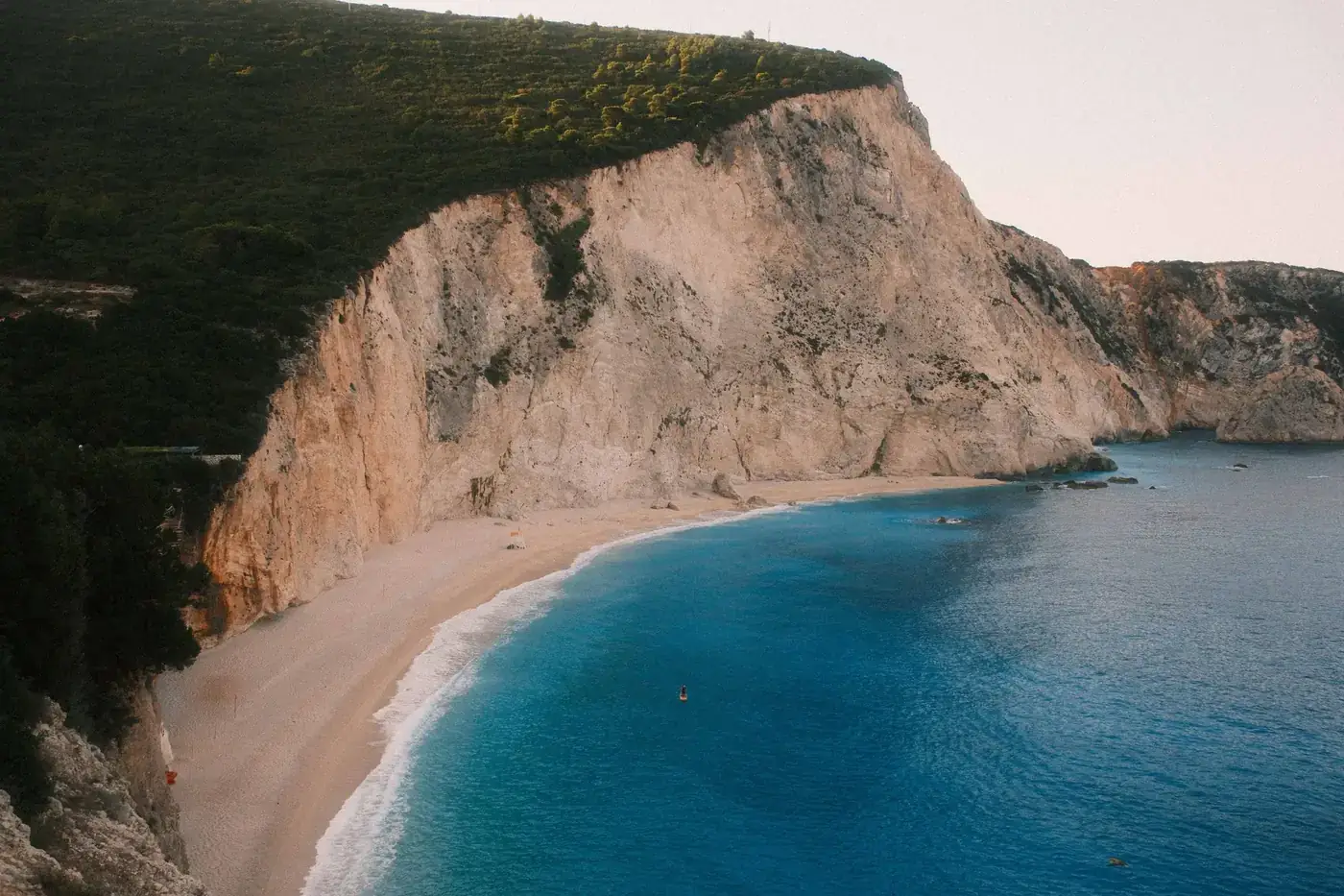 Experience the breathtaking cliffs and azure waters of Porto Katsiki Beach in Lefkada, Greece.