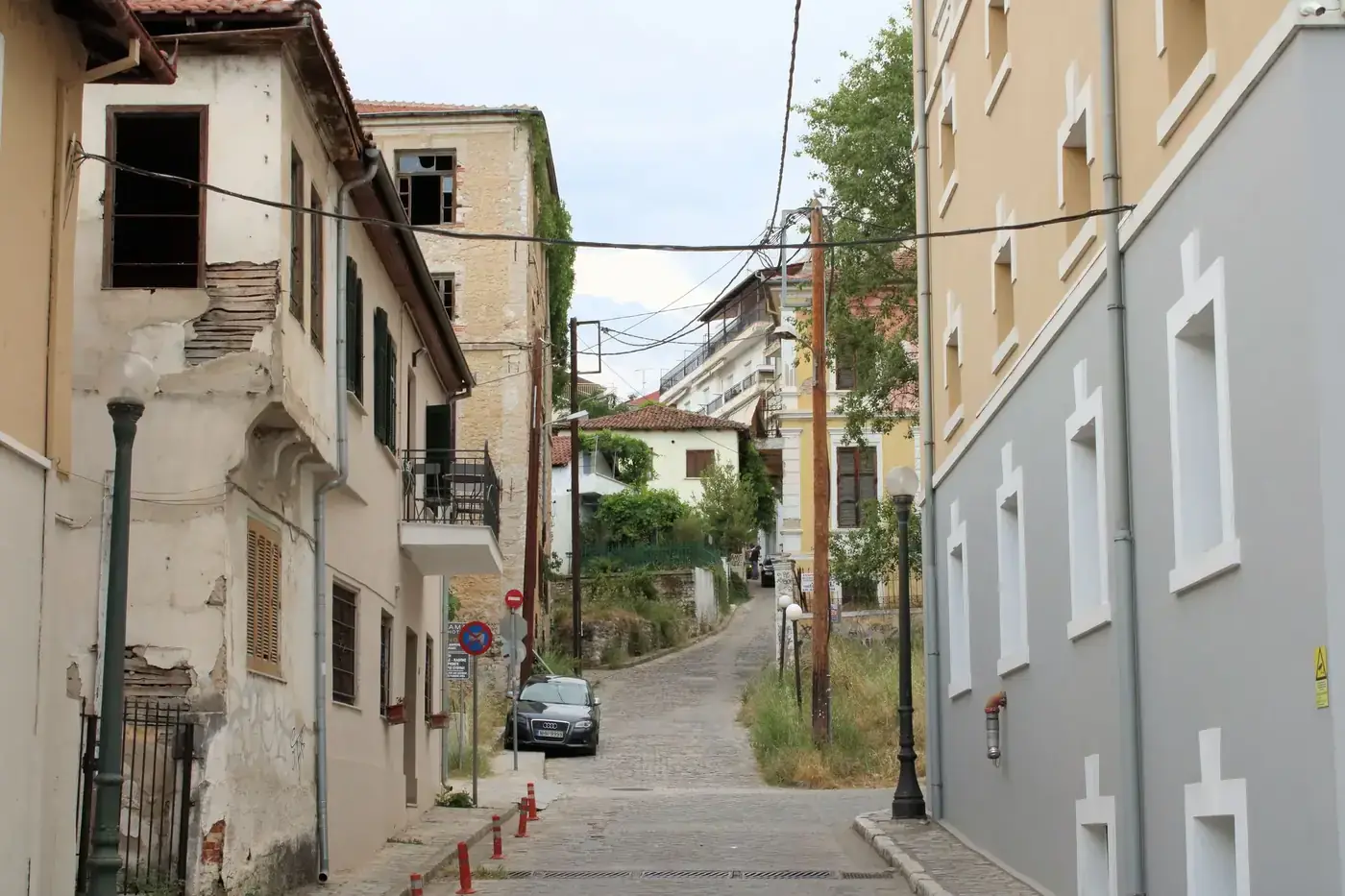 Elegant view of architectural styles and narrow streets in Kavala, Greece, showcasing historic charm.