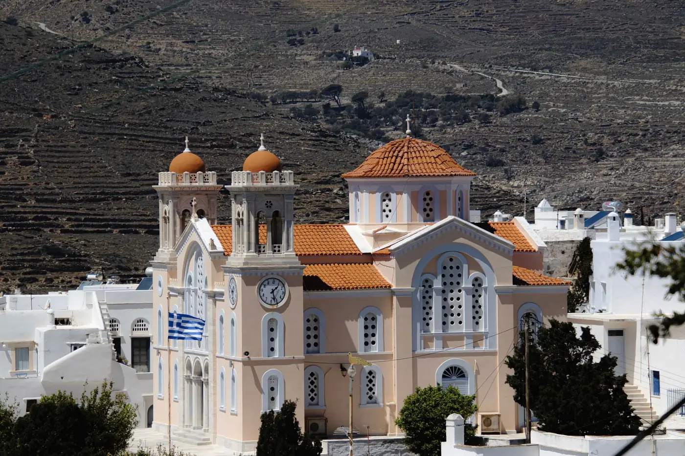 Capture of Agios Nikolaos Church in Tinos, Greece, highlighting its architectural beauty.