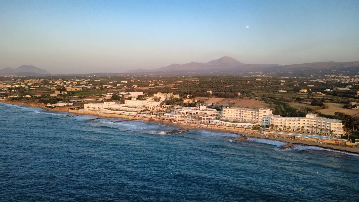 Stunning aerial shot of Adelianos Kampos coastline at sunset, Crete, Greece.